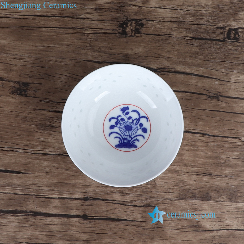 red rice pattern ceramic bowl with flower pattern in the bottom