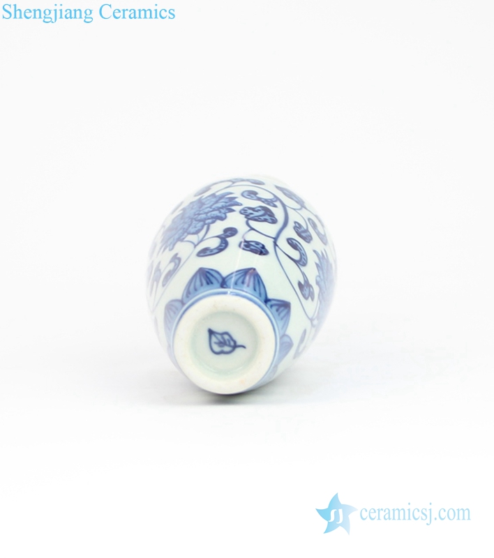 corn flower mini ceramic vase with a leaf in the bottom