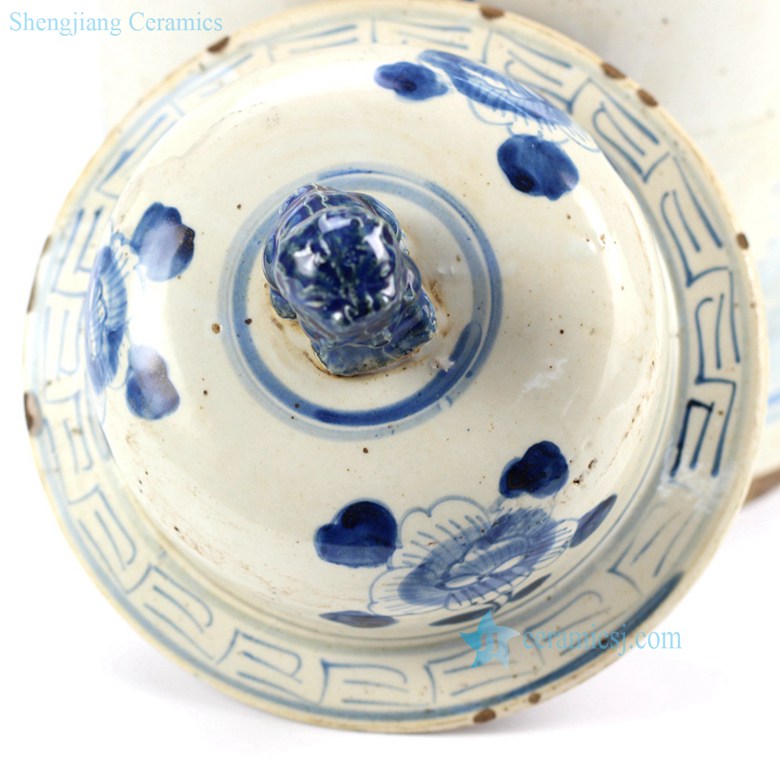 bird floral ceramic jar in blue with a lion lid