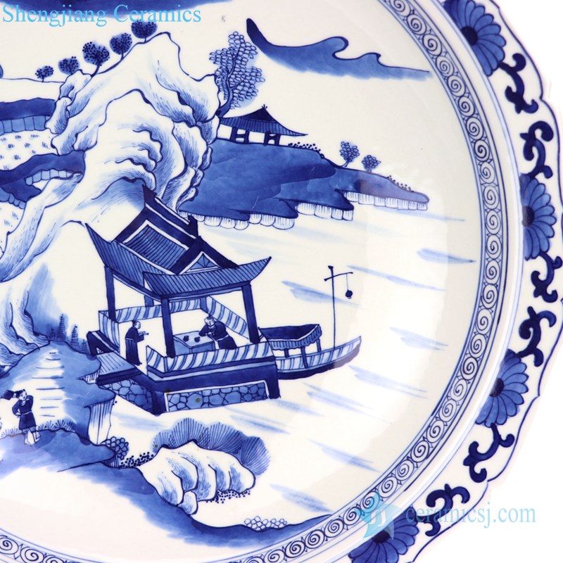 decorative blue and white plate with scenery pattern 