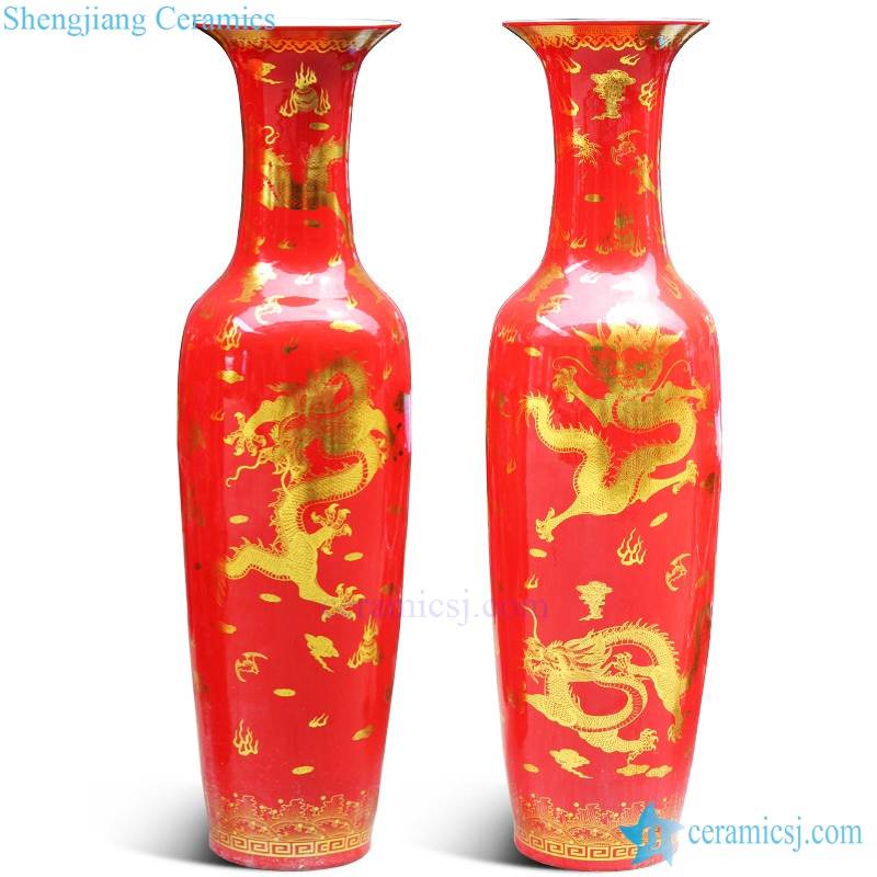Tall red ceramic vase with dragon pattern 